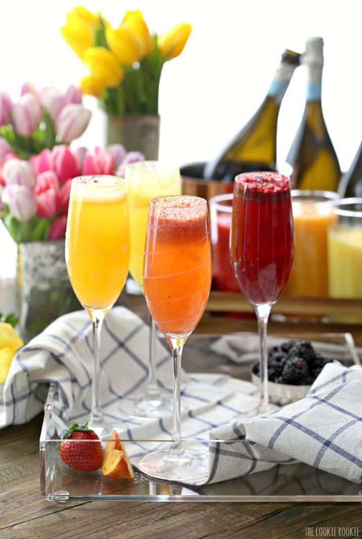 Homemade Bellini Bar made easy with fruit purees and Prosecco! You can use sparkling water for a tasty non-alcoholic brunch or breakfast. So fun and tasty! | The Cookie Rookie