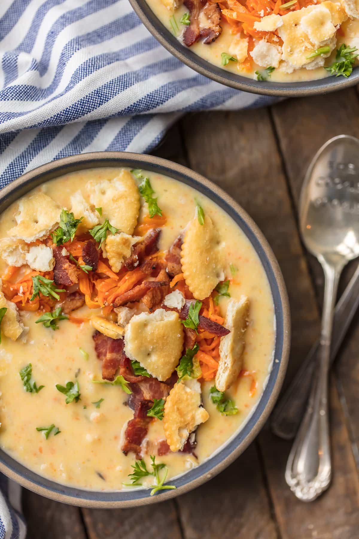 This HASH BROWN POTATO CHEESE SOUP is an absolute Winter MUST MAKE! The ultimate comfort food soup made in minutes. So cheesy and delicious. Topped with sauteed carrots and bacon for extra flavor!