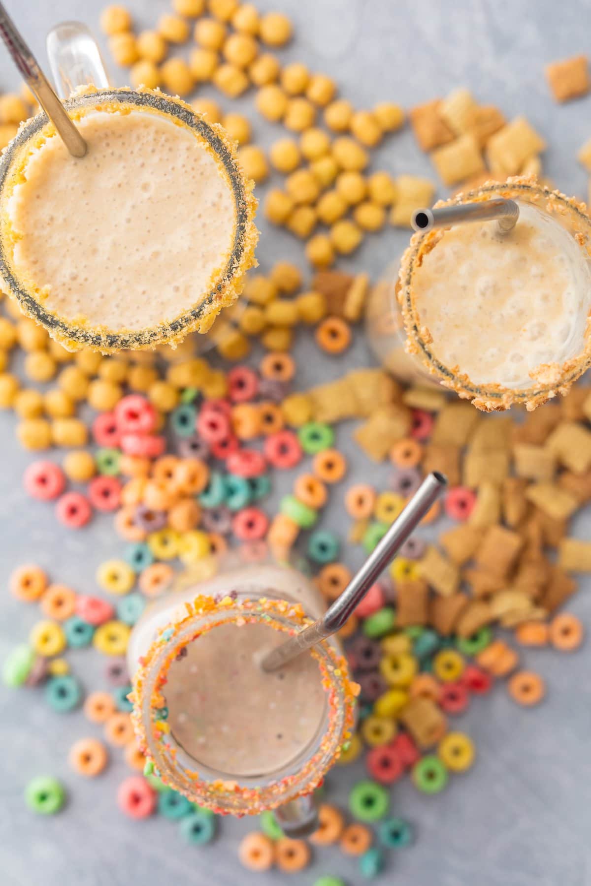 Breakfast Cereal Smoothie (3 Ways!) is a fun, healthy, and easy breakfast the entire family with love! Blend your favorite cereal with milk, bananas, and ice and you're in business! Customizable for any flavor. SO FUN!